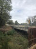 A small bridge crossing over a creek